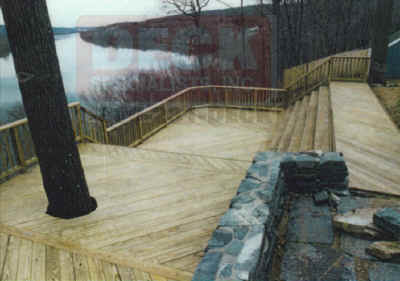 treated deck on hillside of ct river