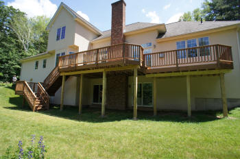 all ipe tall deck with ipe folded stairs after