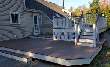 custom morado azek deck with acacia trim and picture framing treatment 2 level custom deck to pool