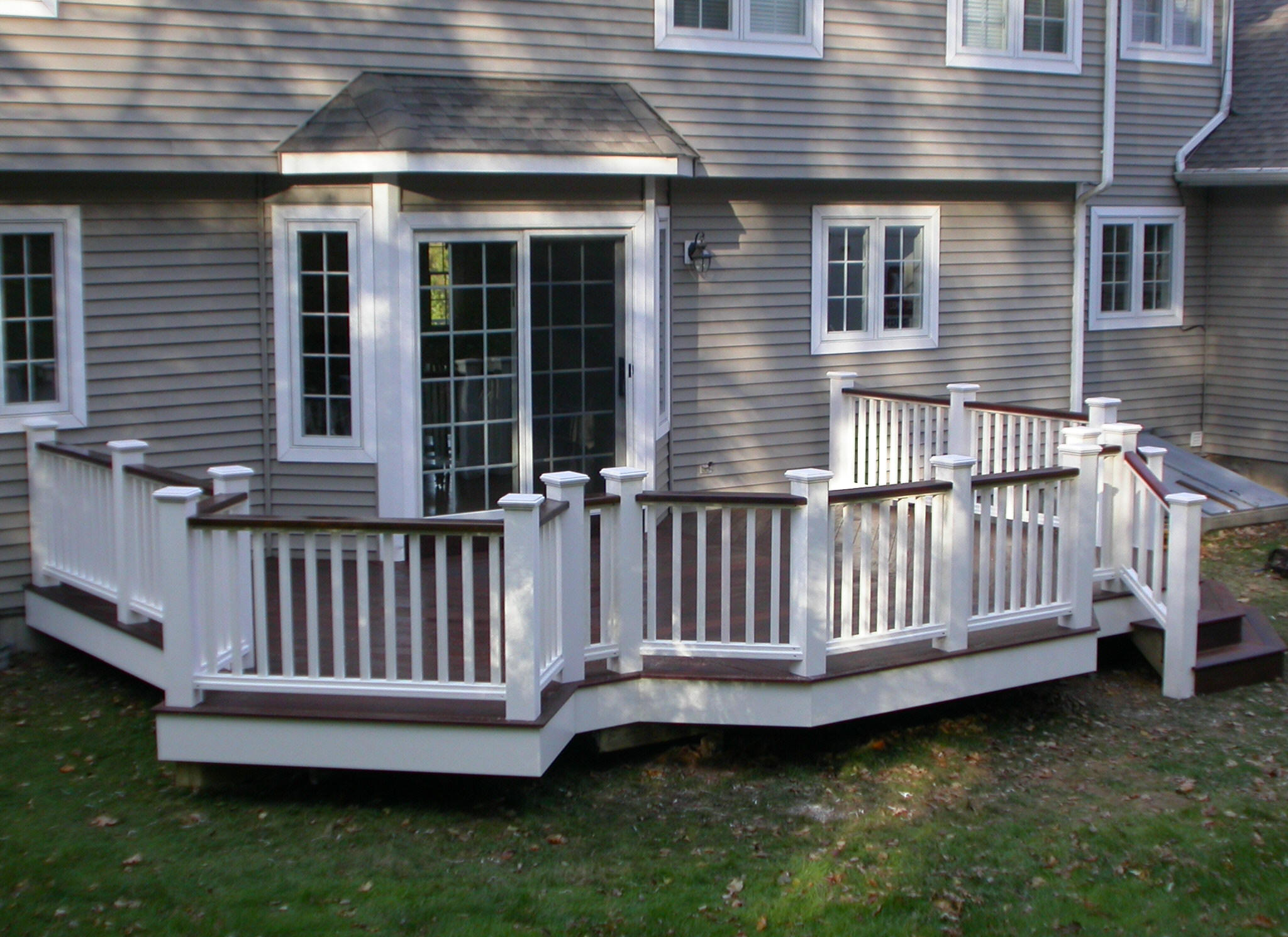 ipe deck with white vinyl rails and kingposts, stadium stairs