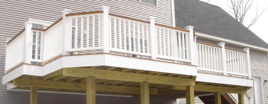 ipe deck with white hdpe vinyl rails king posts and fascia
