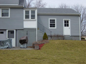 2 level ipe deck with white vinyl rails before