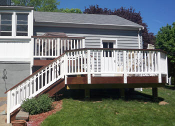 2 level ipe deck with white vinyl rails before