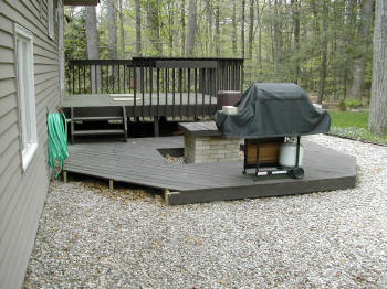 low ipe deck with cascading stairs and benches