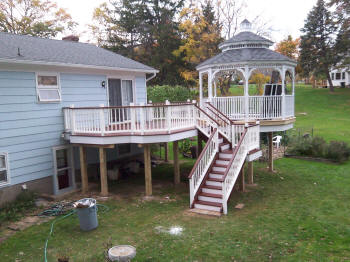 ipe deck with gazebo and turned spindles vinyl