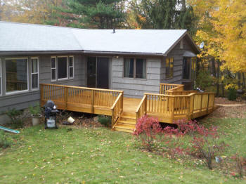 treated deck with access ramp herringbone decking