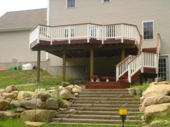 tall ipe deck with stair landing and lower level