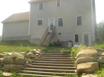 tall ipe deck with stair landing and lower level