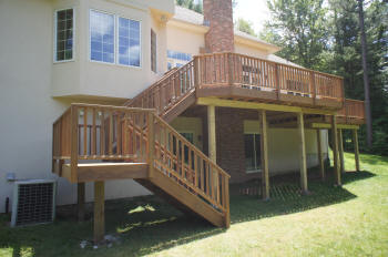 lovely all ipe 2nd level deck with ipe rails and ipe stairs after