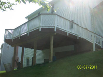 unuseable back yard sloping yard composite deck after