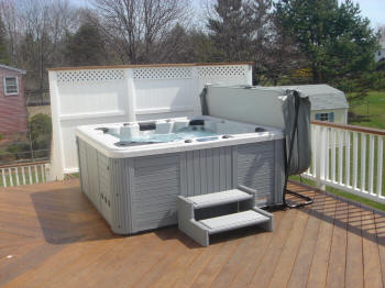 upper level ipe hot tub deck with privacy screen